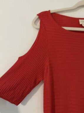 Chico’s red peekaboo sleeve top.